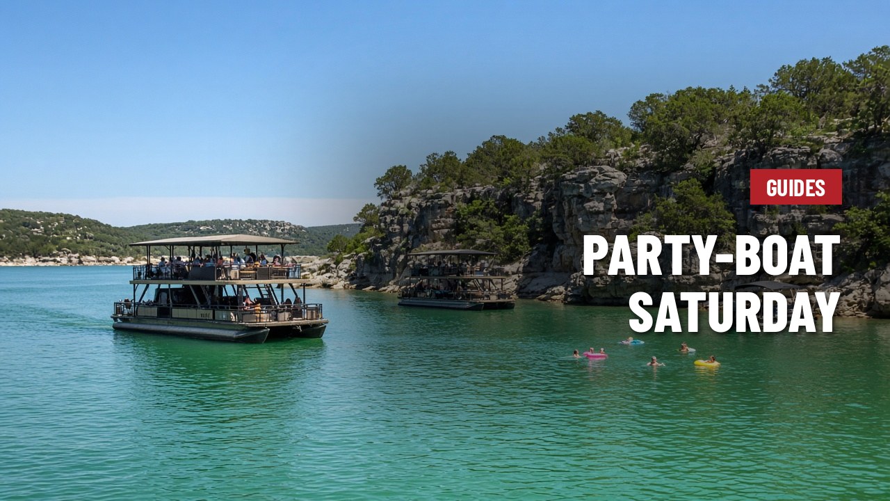 Double-decker party boat on Lake Travis near limestone cliffs, with people on floats
